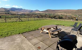 The patio with outdoor furniture, gas grill